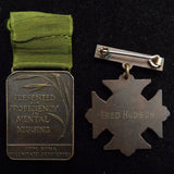 Pair of medals for Proficiency in Mental Nursing to Fred Hudson, 1887 (The Retreat Hospital)
