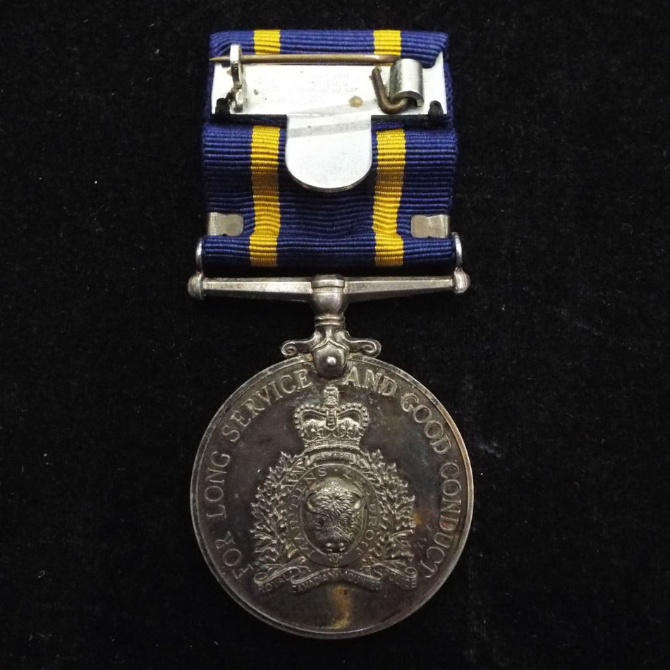The Royal Canadian Mounted Police Long Service Medal (EIIR) and re-award bar (bronze) to 13139 Sgt. F. T. Salter, joined 29/12/38 at Ottowa on Depot, K.H.B.HQ + Air Division