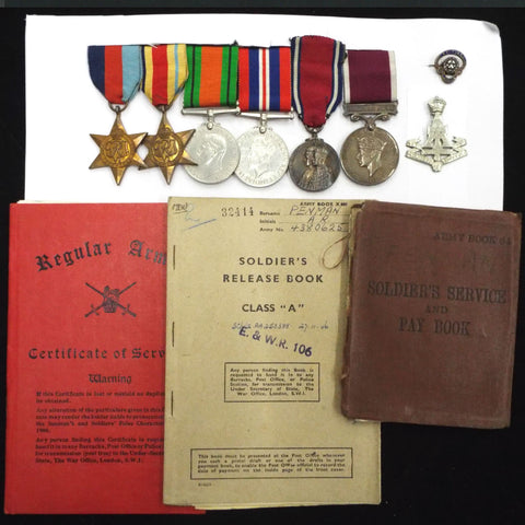 Group of 6 to 4380625 Pte. Artur Robert Penman, 2/Green Howards. Includes large photo of him and a framed certificate for the 1935 Jubilee Medal (scarce King-Emperor issue)
