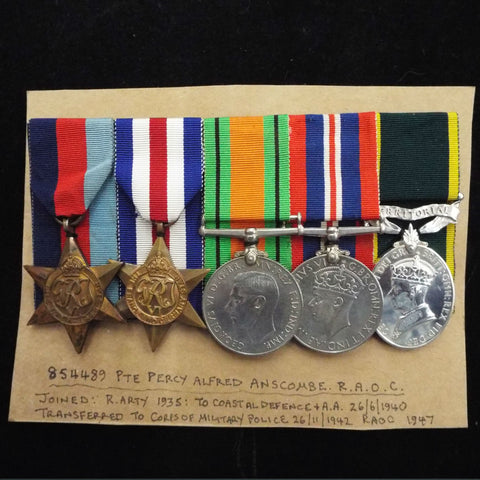 Group of 5 to 864489 Pte. P. A. Anscombe, R.A.O.C. (served in France & Germany 1944-45) wit copy of R. Arty. attestation. Efficiency Medal (GVI) 'Territorial' bar