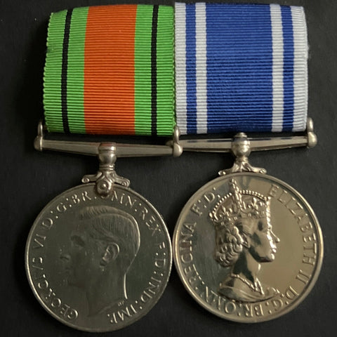 Defence Medal/ Police Long Service & Good Conduct Medal pair to Constable John L. Chapman, served W Division (Clapham) 1931-43, R Division (Greenwich) 1943-57, Commissioner's Commendation 20th January 1950, see history