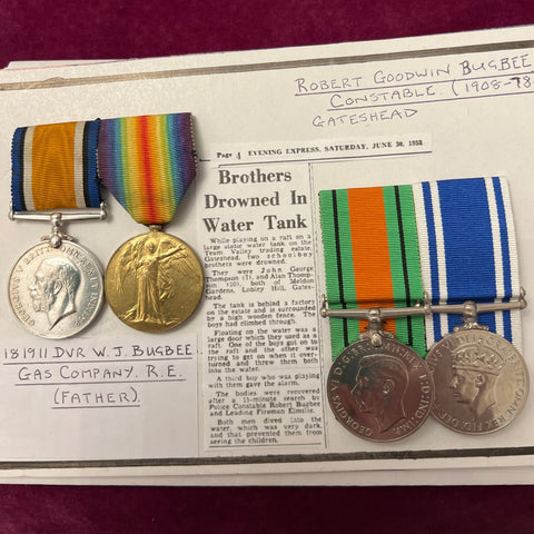 Father & son medal pairs: 181911 Driver W. J. Bugbee, Gas Company R.E. (father) & Constable Robert Goodwin Bugbee, Gateshead. Constable Bugbee tried to rescue two boys who drowned in a water tank, includes news cutting