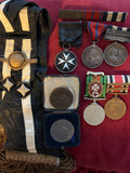 Father & Son medals. Father: Superintendant Alfred B. Moore, St John serving brother. Son: Lance Corporal R. C. E. Moore, St John Ambulance War Service Medal, Somerset bar & shooting medals. See description, an interesting lot