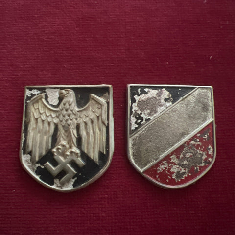 Nazi Germany, pair of pith helmet badges, some wear