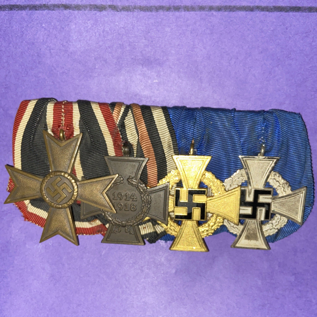 Nazi Germany, an interesting civil group of 4: Civil War Merit Cross, Cross of Honour (no swords), Faithful Service Cross 25 Years & Faithful Service Cross 40 Years