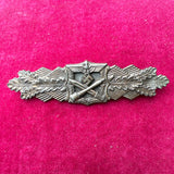 Nazi Germany, Close Combat Clasp, an excellent example in bronze, marked J.F.S., good finish