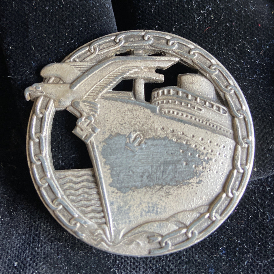Nazi Germany, Blockade Runner's Badge, marked 'Schwerin, Berlin' on reverse, somewhat tatty