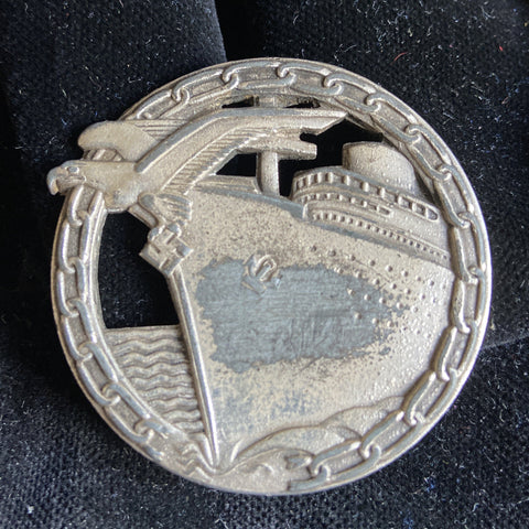 Nazi Germany, Blockade Runner's Badge, marked 'Schwerin, Berlin' on reverse, somewhat tatty