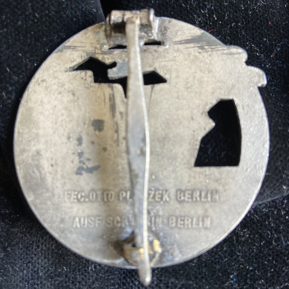 Nazi Germany, Blockade Runner's Badge, marked 'Schwerin, Berlin' on reverse, somewhat tatty