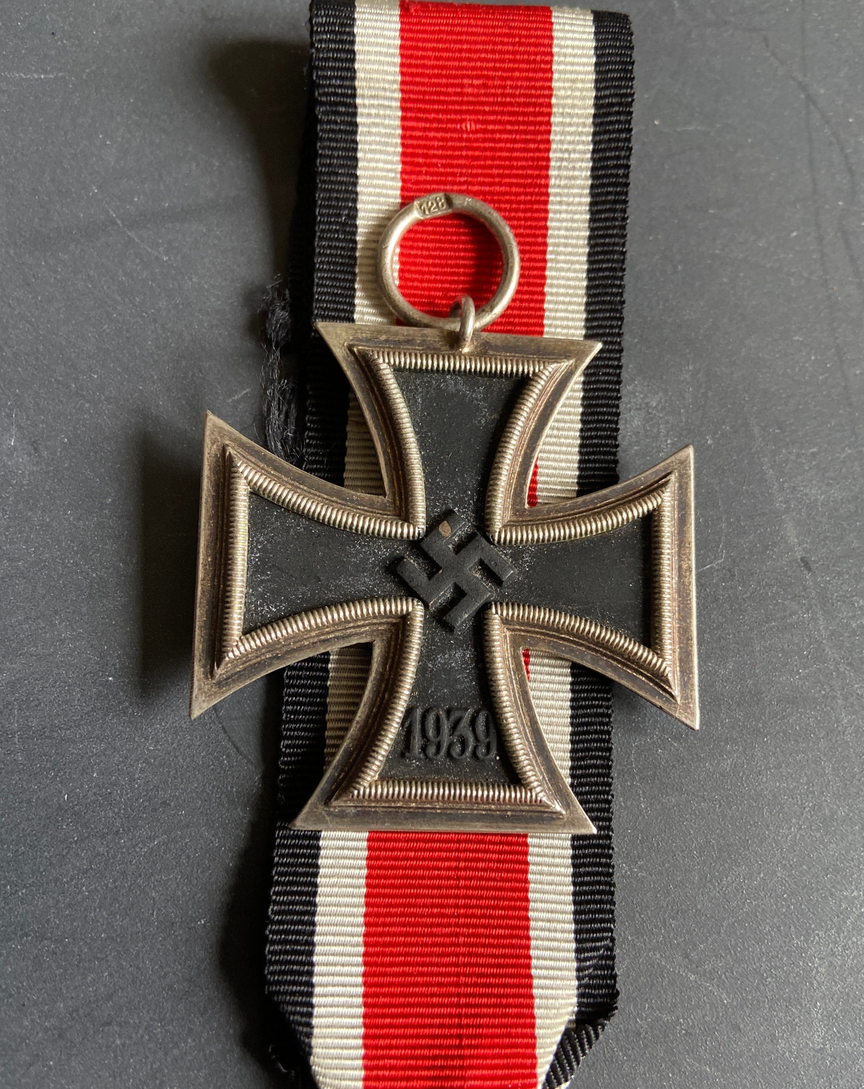 Nazi Germany, Iron Cross, maker marked no.128, with original ribbon, a ...