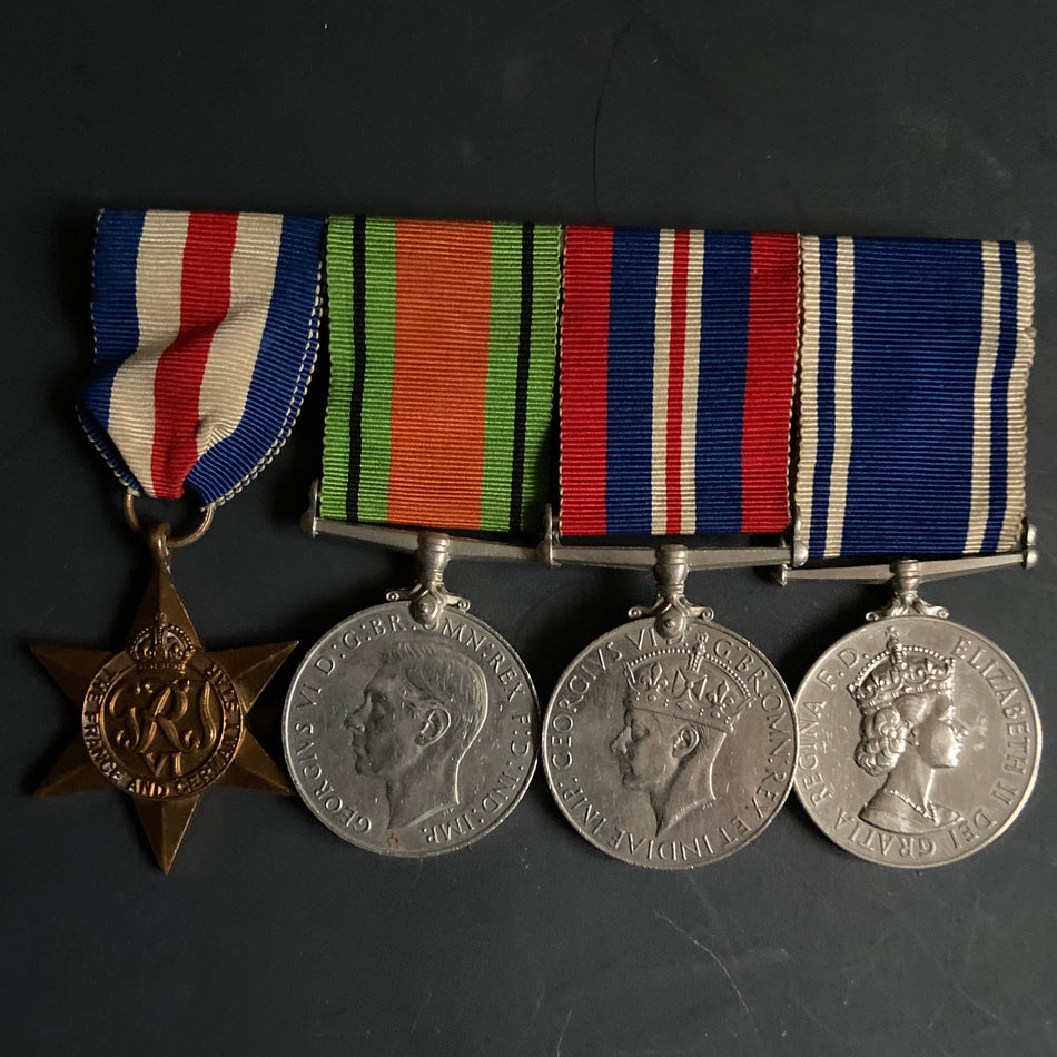 Police group of 4 to Inspector Harrison S. Small