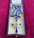Nazi Germany, Mother's Cross, in box of issue, marked C. F. Zimmerman, 1st class, some wear