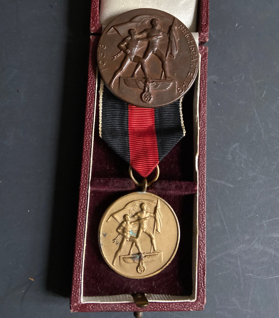 Nazi Germany, Entry into Czechoslovakia, 1 October 1938, with original box of issue & also a cast-iron Party Day medallion, 1938