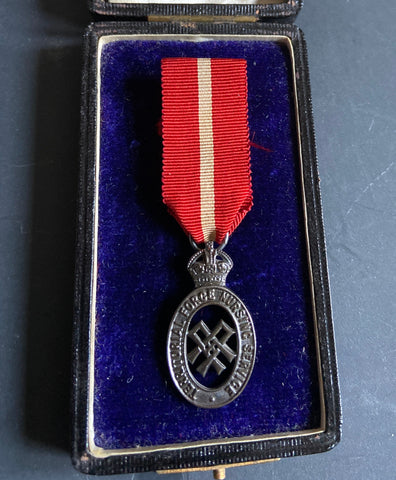Territorial Force Nursing Service cape badge, in original case made by J. R. Gaunt and Son, London