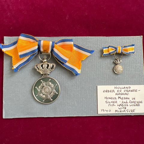 Dutch medal to the Order of Orange, Nassau, 2nd class, in silver on ladies' bow, with miniature