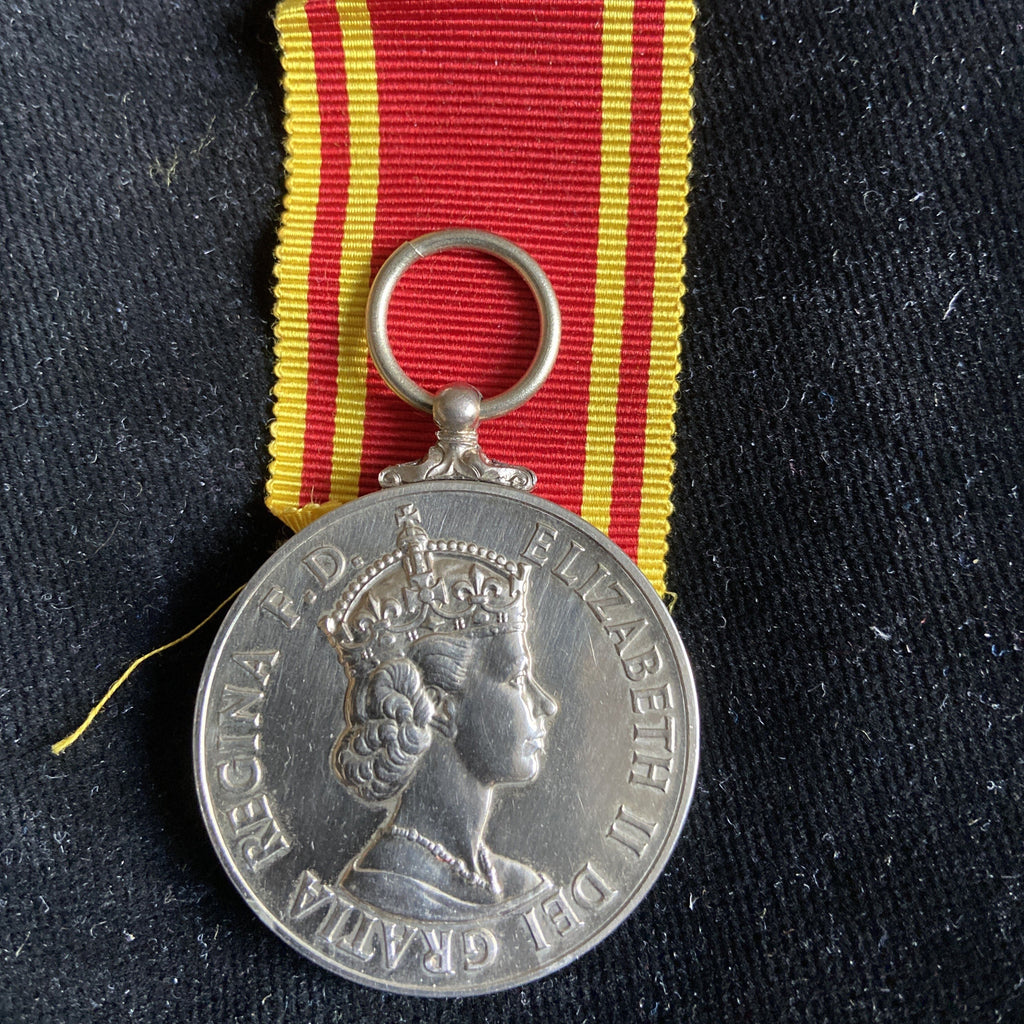 Fire Brigade Long Service and Good Conduct Medal to Cyril J. Robertson, Eastern Station, with award, Brigade Headquarters, 22 October 1970