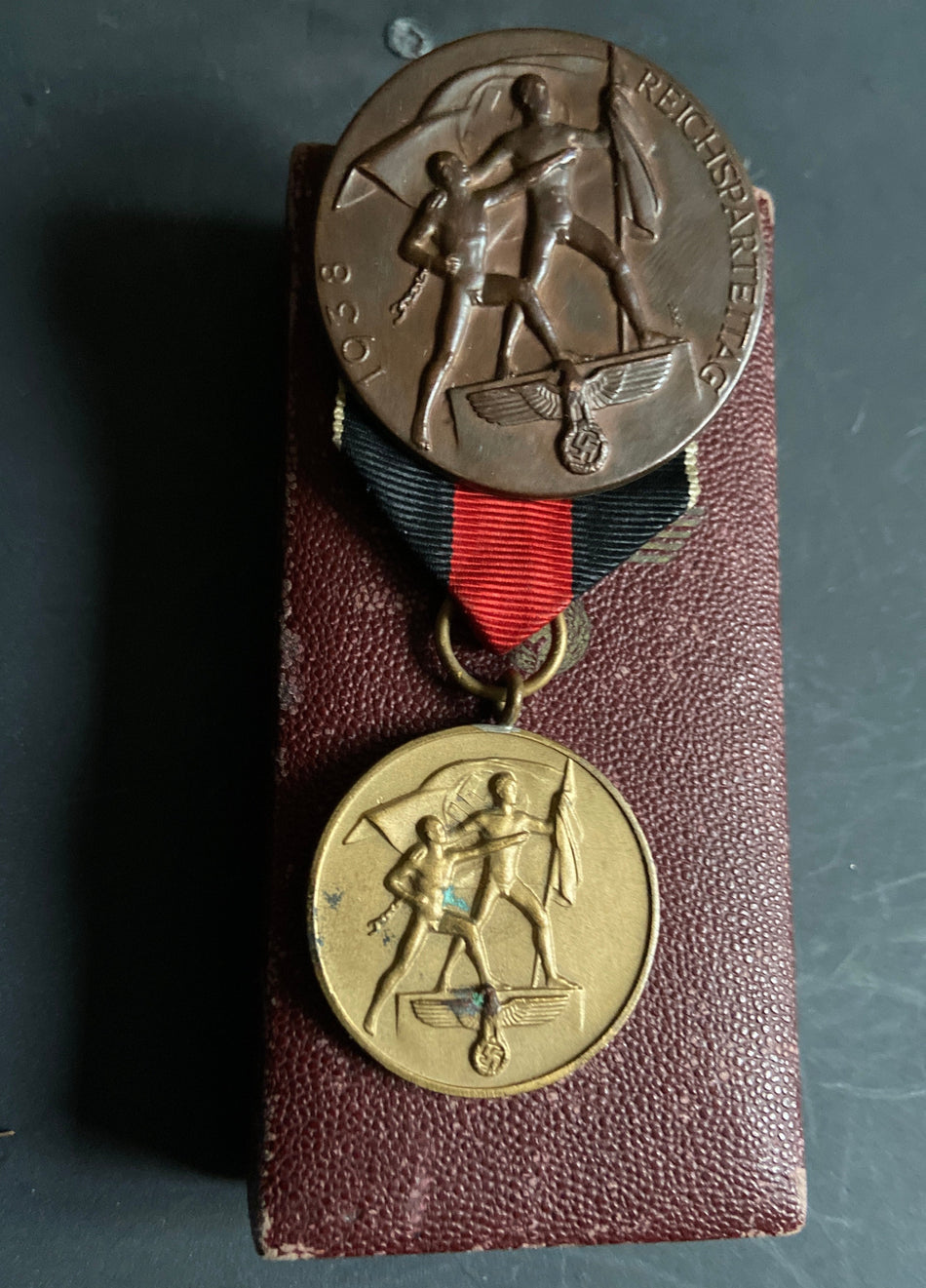 Nazi Germany, Entry into Czechoslovakia, 1 October 1938, with original box of issue & also a cast-iron Party Day medallion, 1938