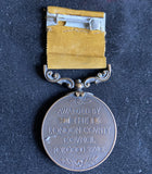 London Fire Brigade Medal, awarded by the London County Council for Good Service, to Victor H. Dio, 1954
