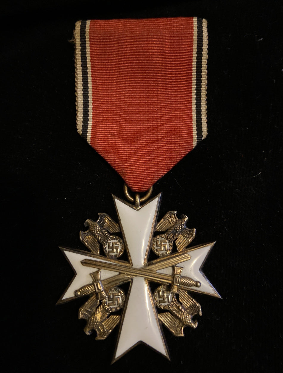 Nazi Germany, Order of the German Eagle, with swords, knight class, 1937 type, small chip to reverse hair crack, scarce