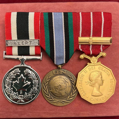 Canadian group of 3 to Cpl. J. C. L. Couture, with Special Service medal, Alert bar, Canadian Forces Station Cape Sheridan, Alert Wireless Station, Northwest Territories, Joint Arctic Station, with some history