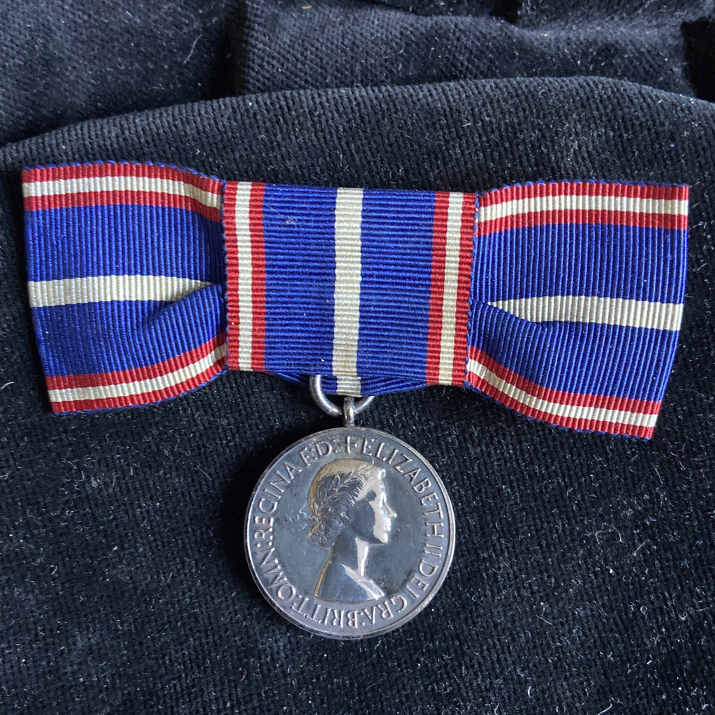 Royal Victorian Medal, silver, first issue of Queen Elizabeth II, 1953-54, with foreign ribbon on ladies bow, scarce