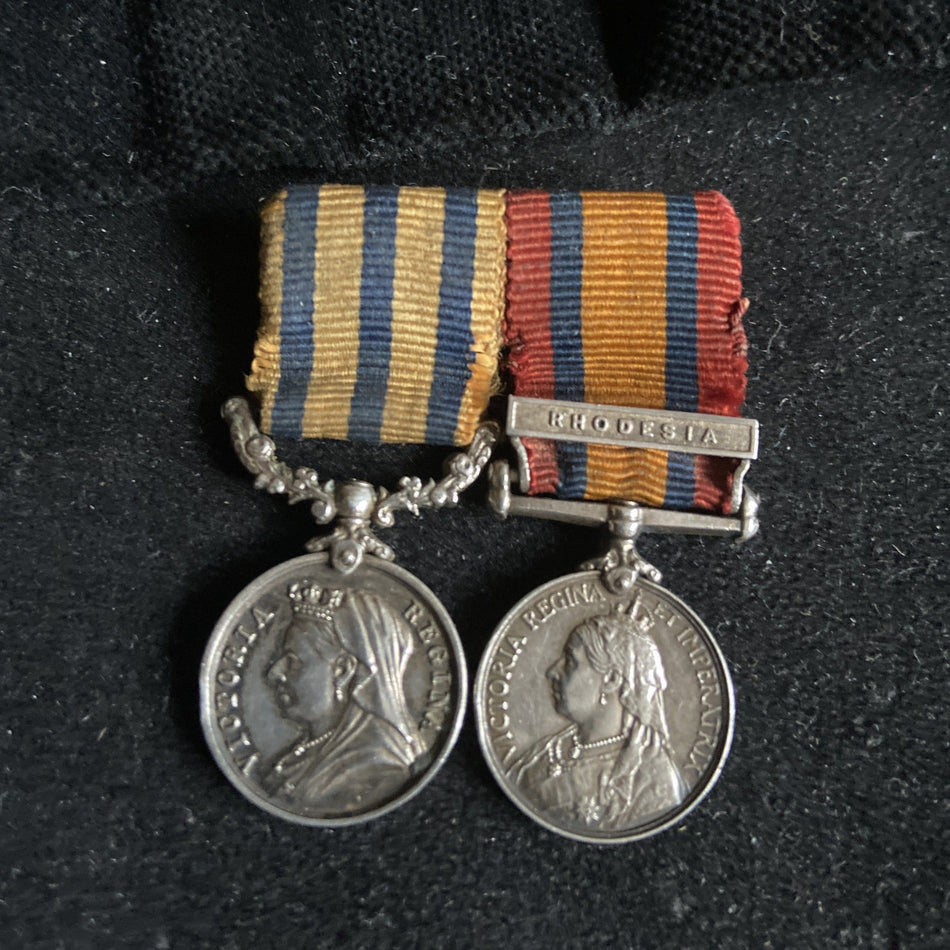 Miniature British South Africa Medal (Rhodesia on reverse)/ Queen's South Africa Medal (Rhodesia bar) pair